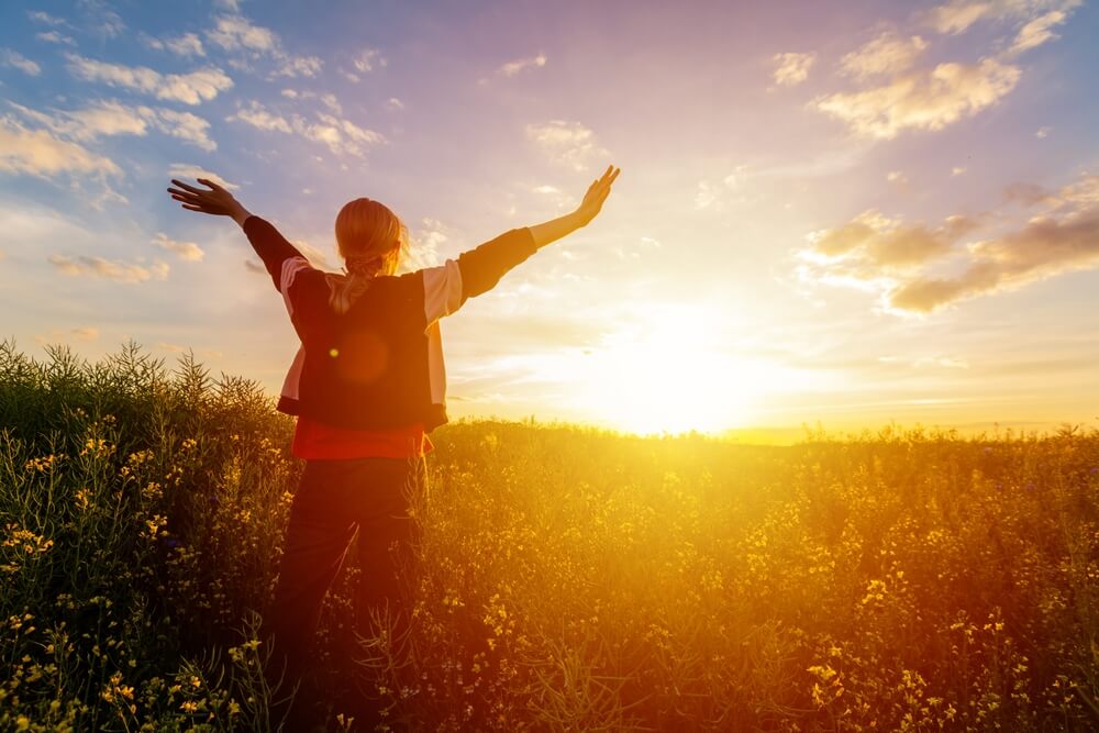 Happy woman in a field